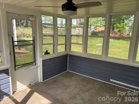 a view of an empty room and window