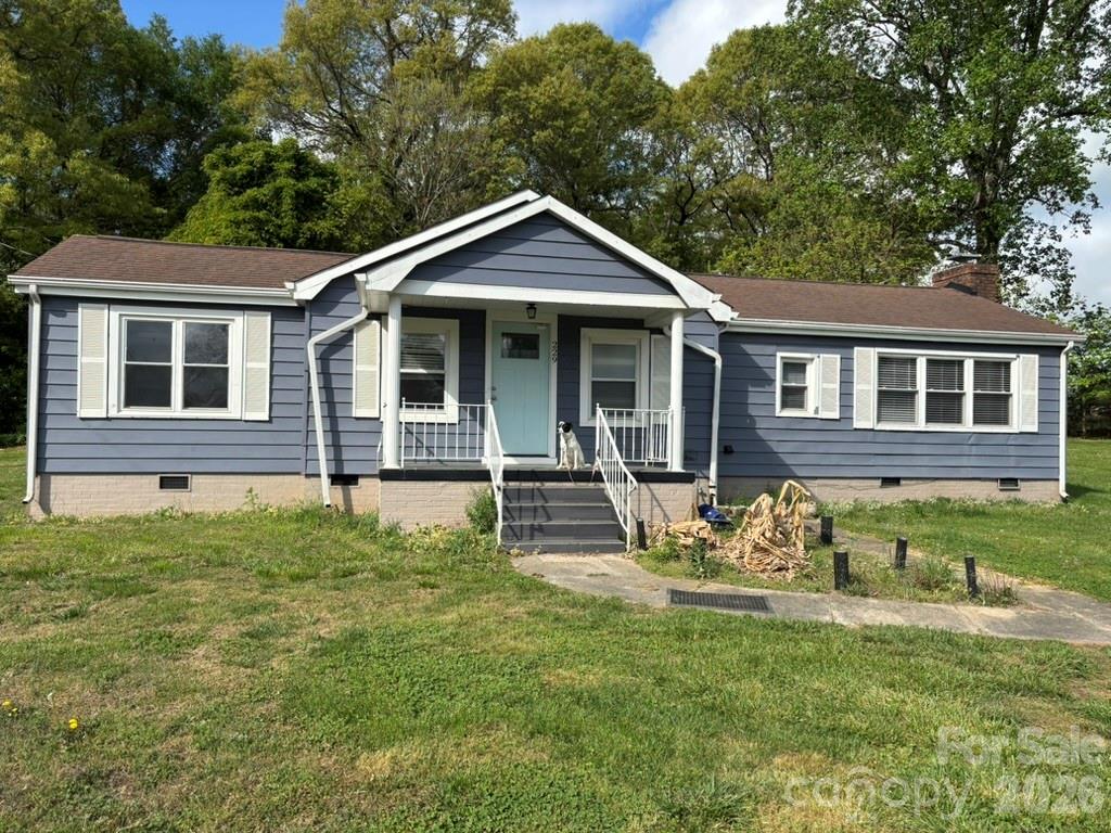 229 Browntown Road Belmont, NC 28012 - Photo 2 of 23 a front view of a house with a yard