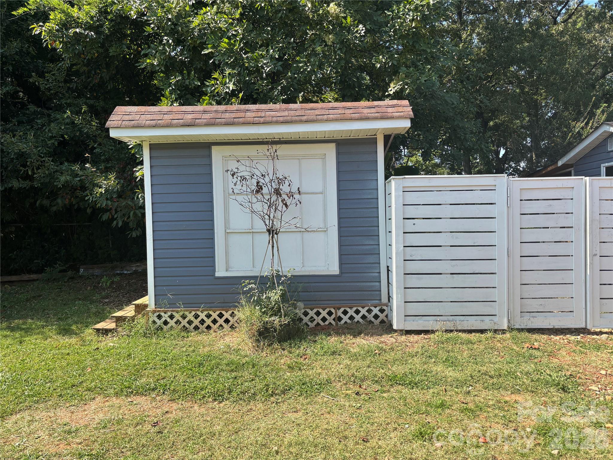 229 Browntown Road Belmont, NC 28012 - Photo 23 of 23 a front view of a house with a yard