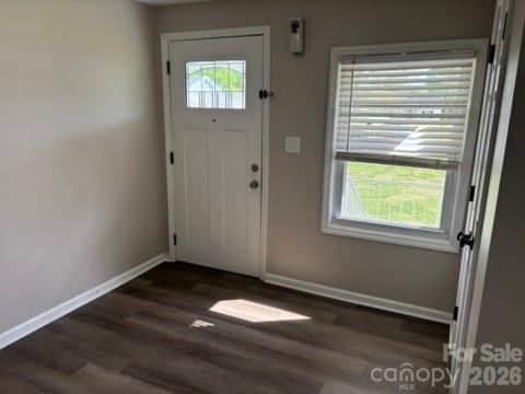 229 Browntown Road Belmont, NC 28012 - Photo 4 of 23 an empty room with wooden floor and windows