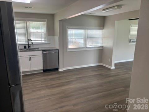 229 Browntown Road Belmont, NC 28012 - Photo 7 of 23 a view of an empty room with a window and wooden floor