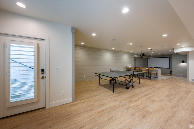 630 East Center Street Alpine, UT 84004 - Photo 65 of 115 Spacious recreation area featuring wood-finish flooring, recessed lighting, and shiplap accent walls