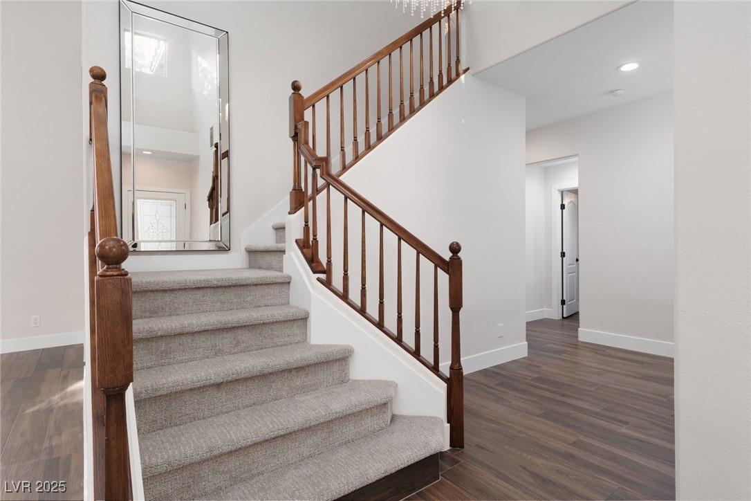 7837 Fort Ruby Place Las Vegas, NV 89128 - Photo 13 of 50 Stairway with recessed lighting and wood finished floors