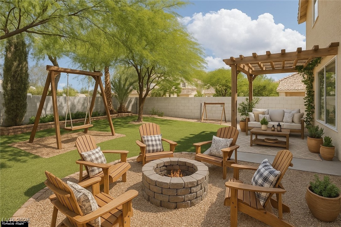 7837 Fort Ruby Place Las Vegas, NV 89128 - Photo 30 of 50 Virtually Staged Fenced backyard featuring a patio, a pergola, and an outdoor living space with a fire pit