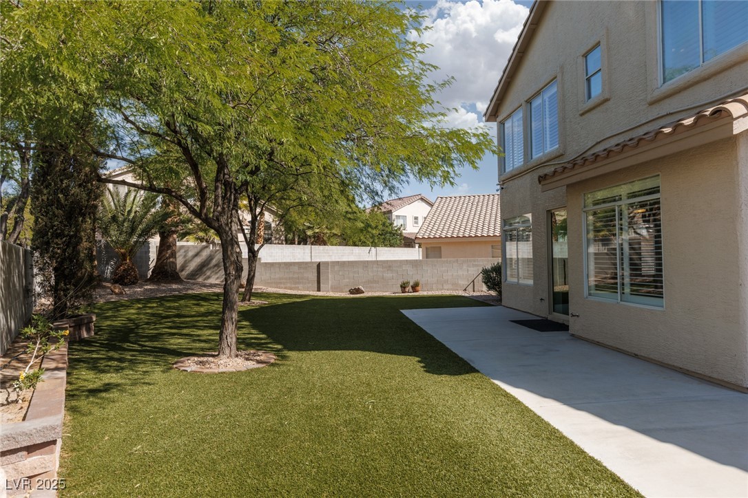 7837 Fort Ruby Place Las Vegas, NV 89128 - Photo 32 of 50 View of yard featuring a patio area