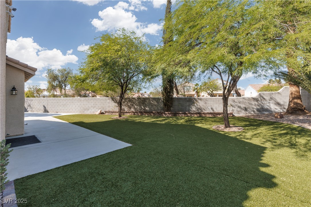 7837 Fort Ruby Place Las Vegas, NV 89128 - Photo 37 of 50 View of yard featuring a patio