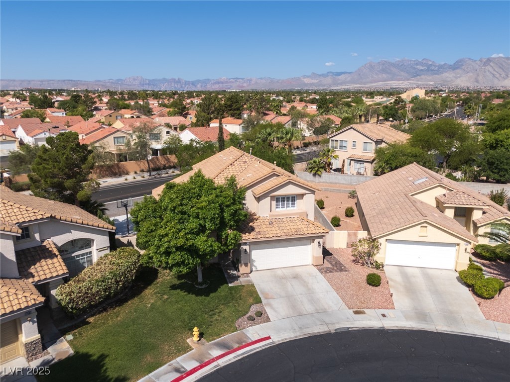 7837 Fort Ruby Place Las Vegas, NV 89128 - Photo 40 of 50 Aerial perspective of suburban area with a mountainous background