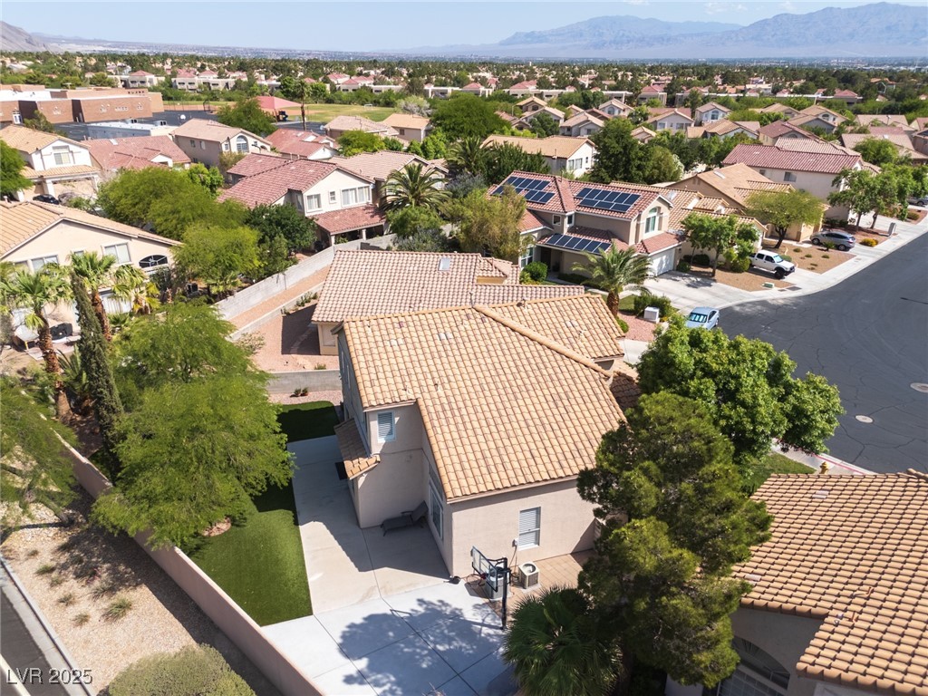 7837 Fort Ruby Place Las Vegas, NV 89128 - Photo 43 of 50 Aerial perspective of suburban area with mountains