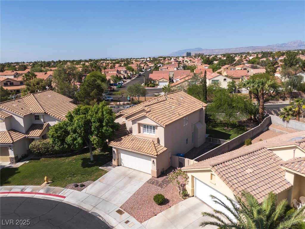 7837 Fort Ruby Place Las Vegas, NV 89128 - Photo 45 of 50 Aerial view of residential area featuring mountains