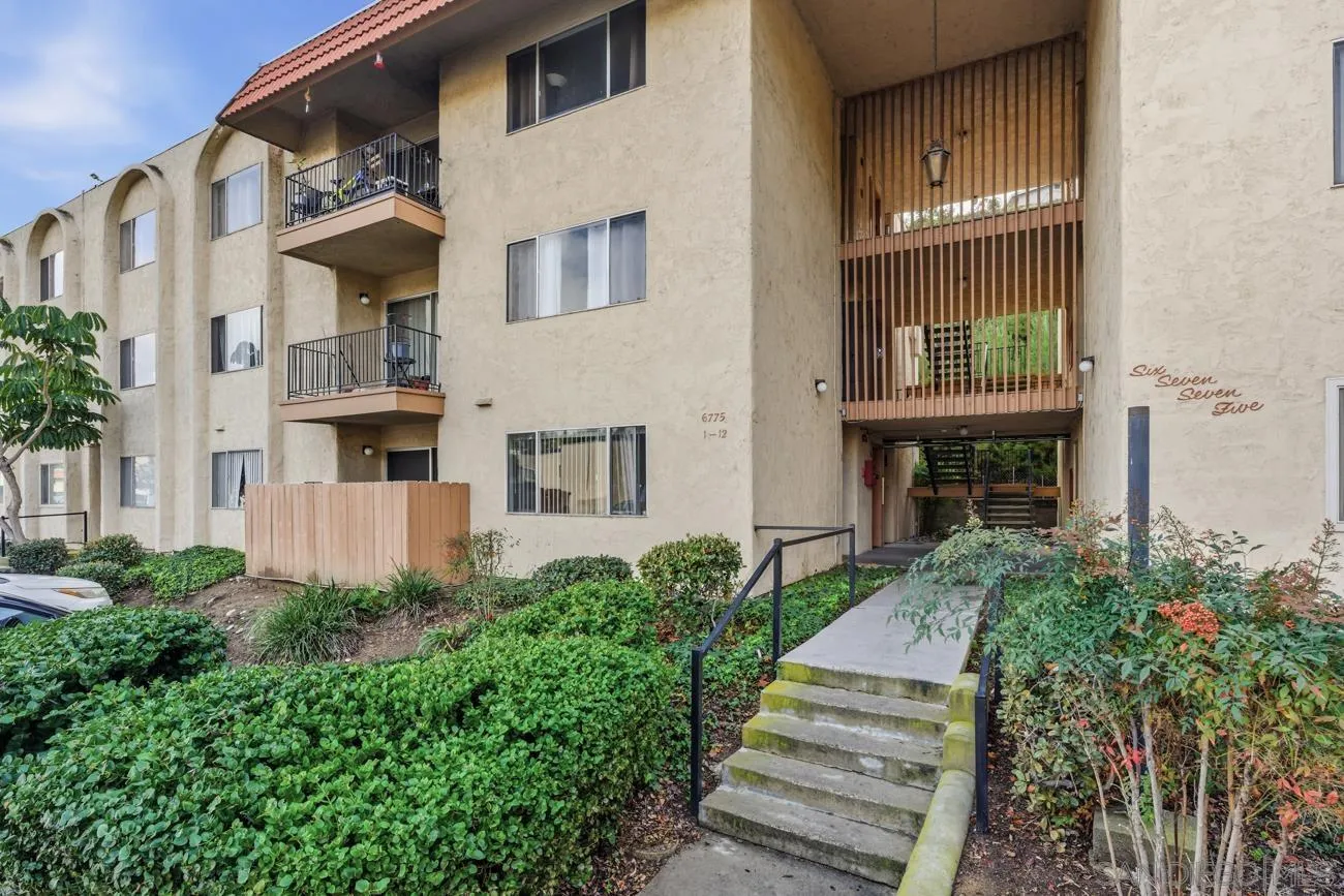 6775 Alvarado Road, Unit 10 San Diego, CA 92120 - Photo 1 of 22 a front view of a house with a garden