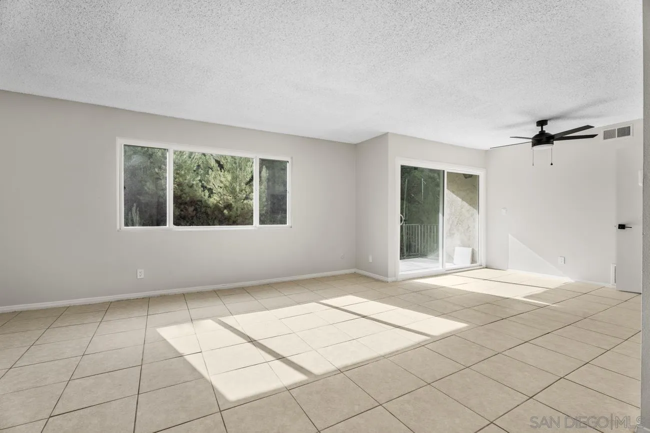 6775 Alvarado Road, Unit 10 San Diego, CA 92120 - Photo 4 of 22 a view of an empty room with a window