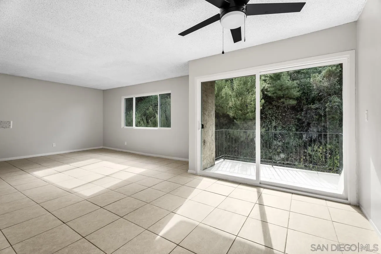 6775 Alvarado Road, Unit 10 San Diego, CA 92120 - Photo 6 of 22 a view of an empty room and window