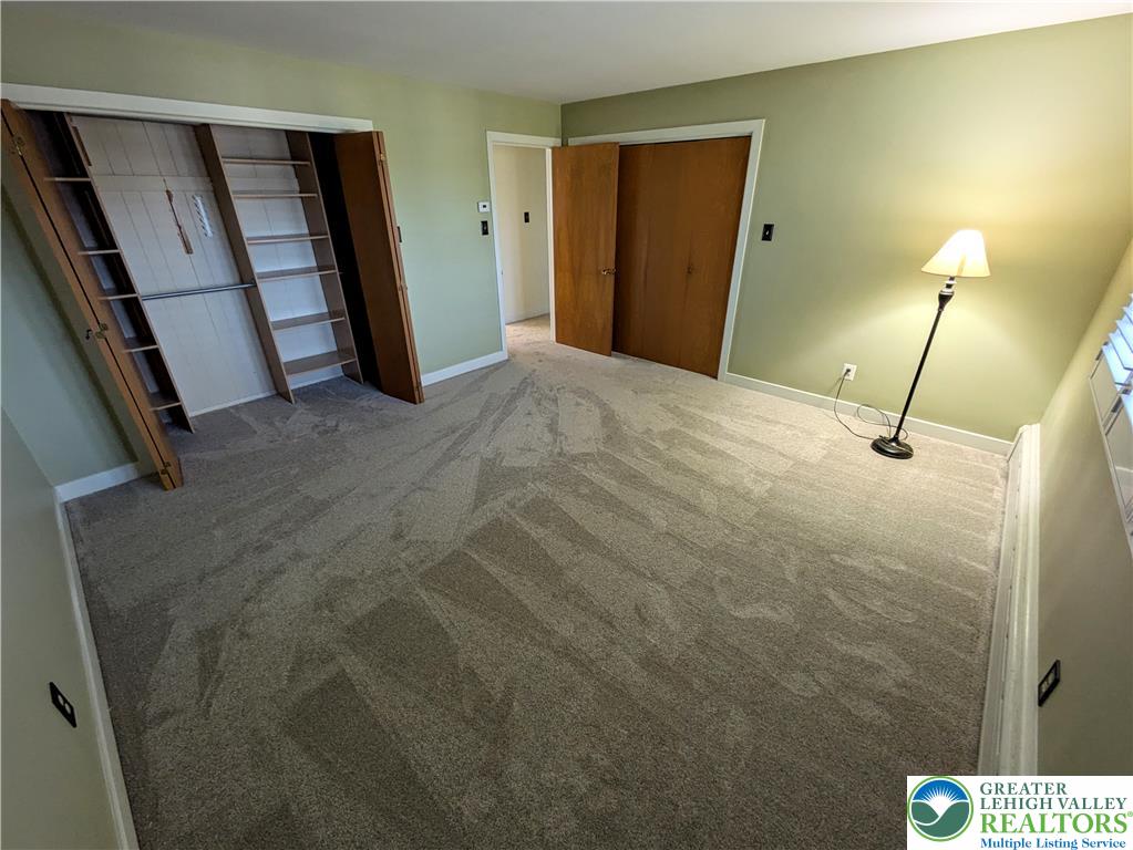 3285 Cherryville Road Northampton, PA 18067 - Photo 20 of 51 Ample closet space and fresh carpeting define this comfortable secondary bedroom.