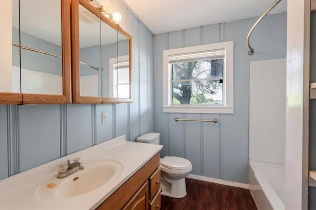 a bathroom with a sink and a toilet
