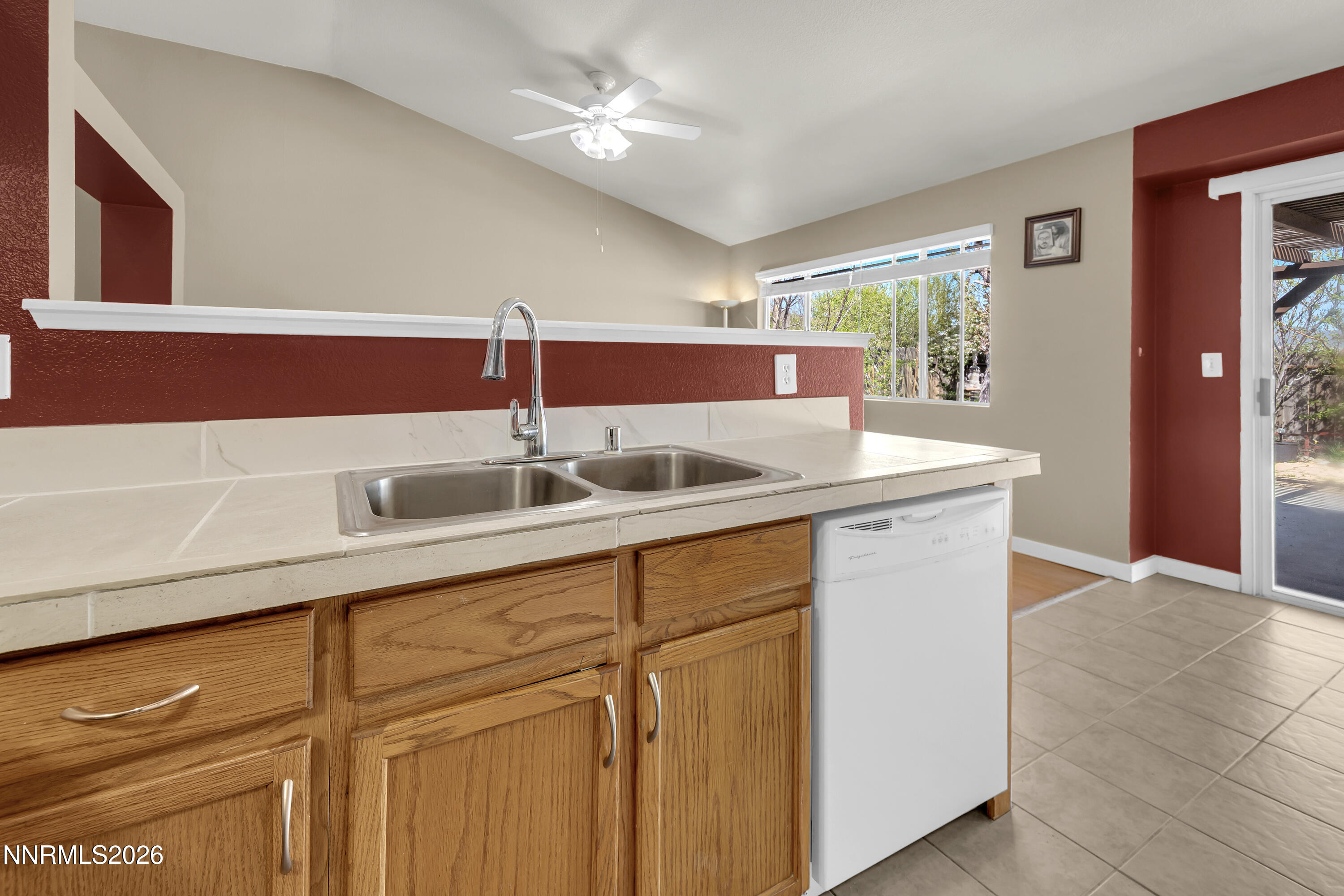 7951 Big River Drive Reno, NV 89506 - Photo 13 of 30 a kitchen with stainless steel appliances granite countertop a sink and a cabinets