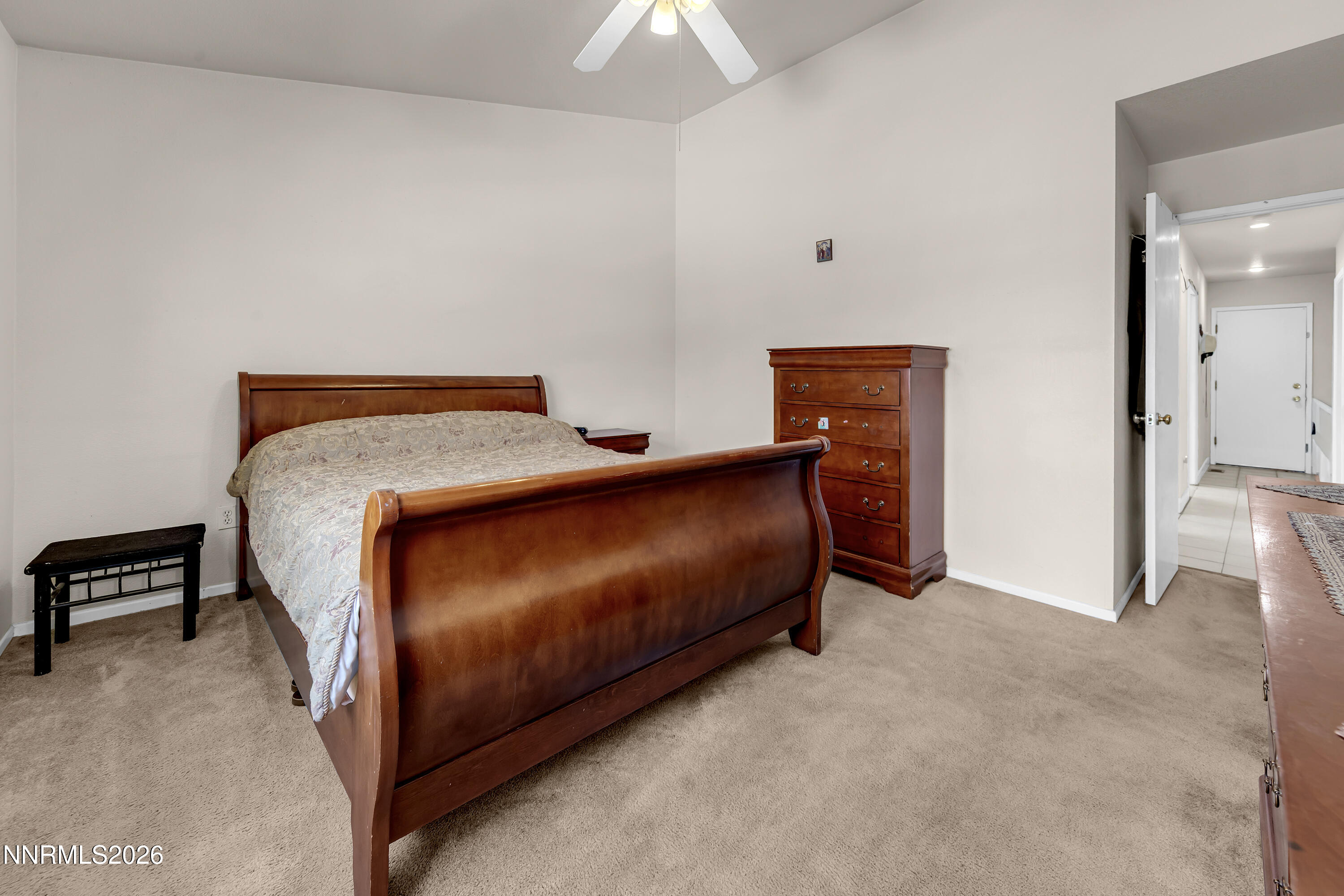 7951 Big River Drive Reno, NV 89506 - Photo 15 of 30 a bed room with a bed and a chandelier