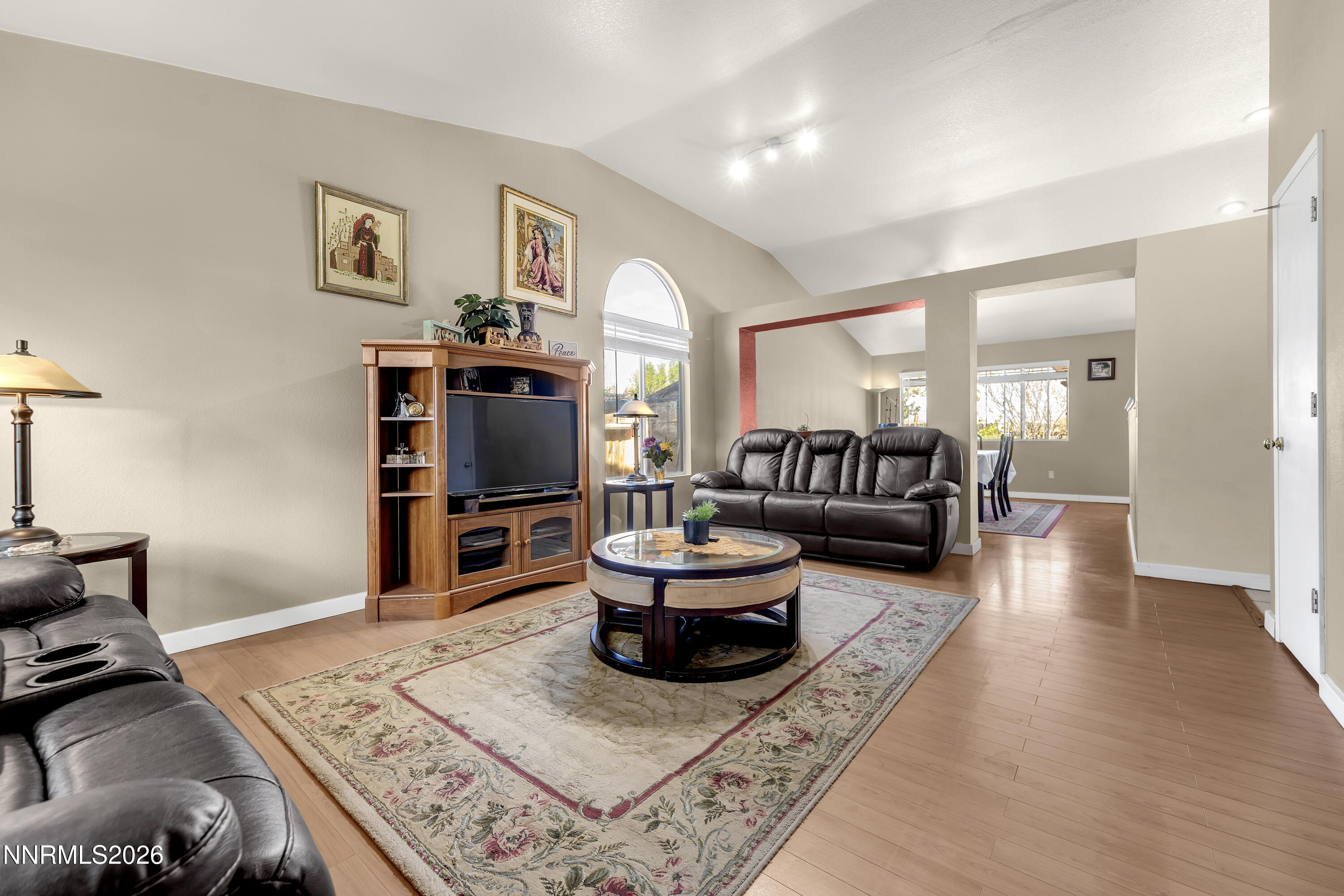 7951 Big River Drive Reno, NV 89506 - Photo 2 of 30 a living room with furniture and a wooden floor