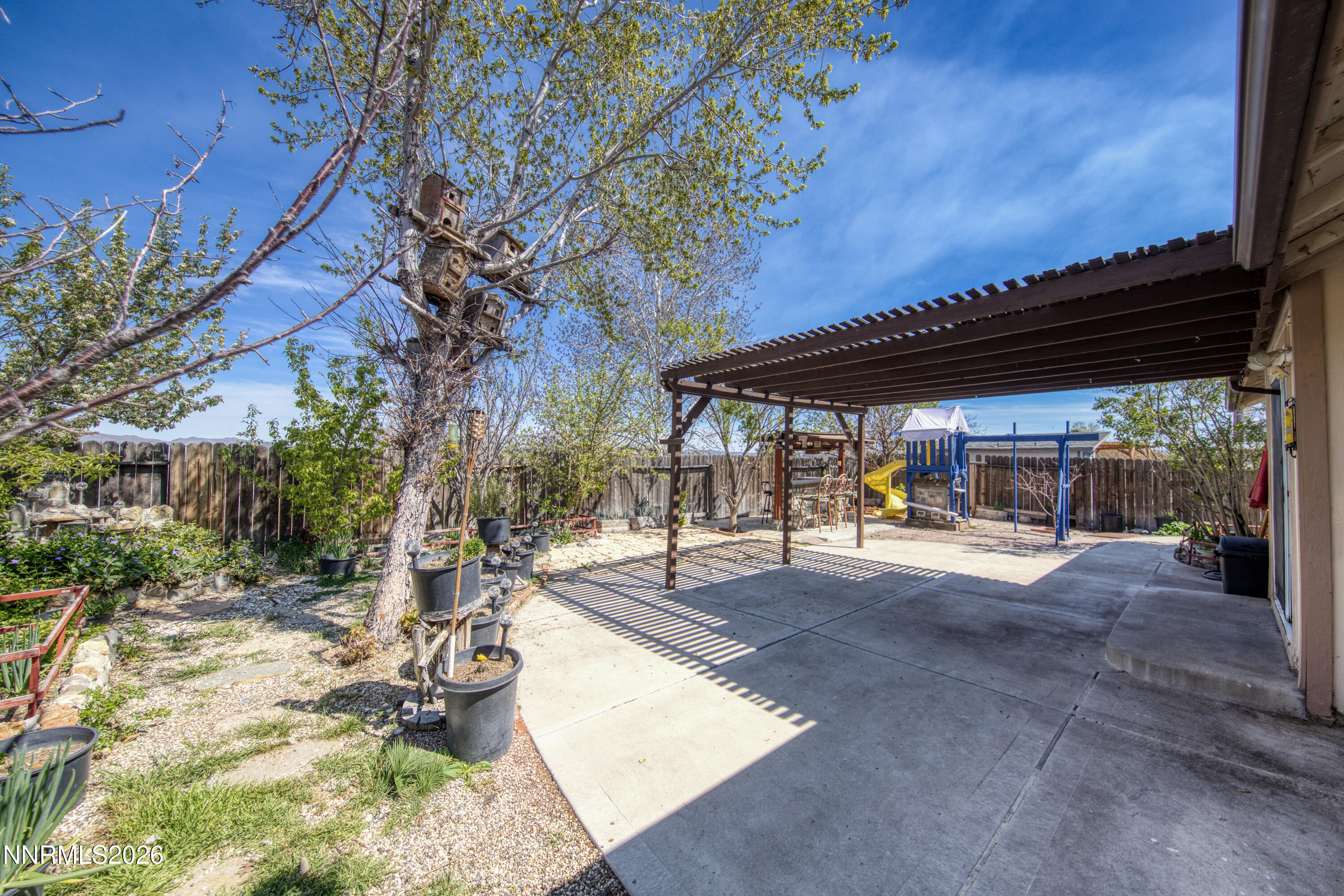 7951 Big River Drive Reno, NV 89506 - Photo 22 of 30 a view of a backyard with sitting area