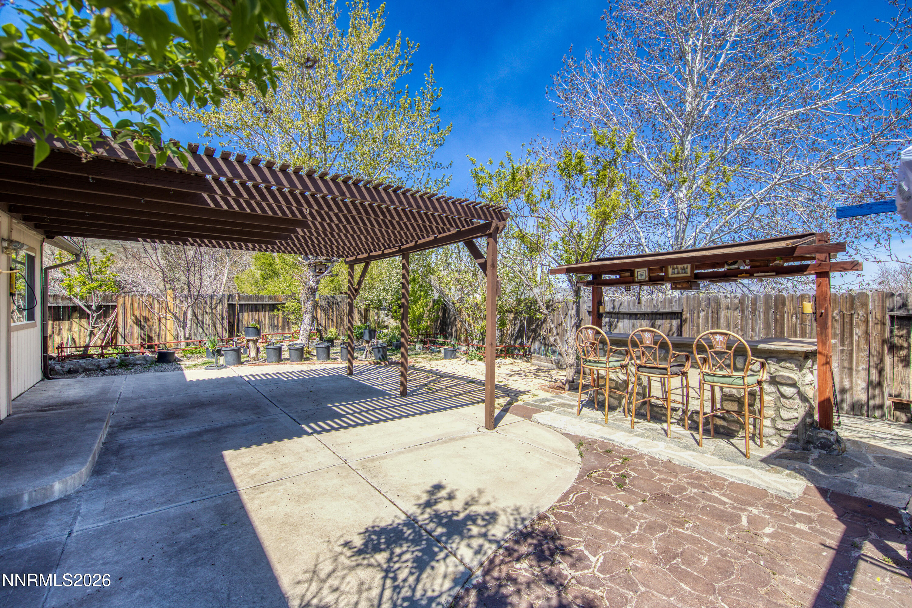 7951 Big River Drive Reno, NV 89506 - Photo 26 of 30 a view of a patio with a table and chairs