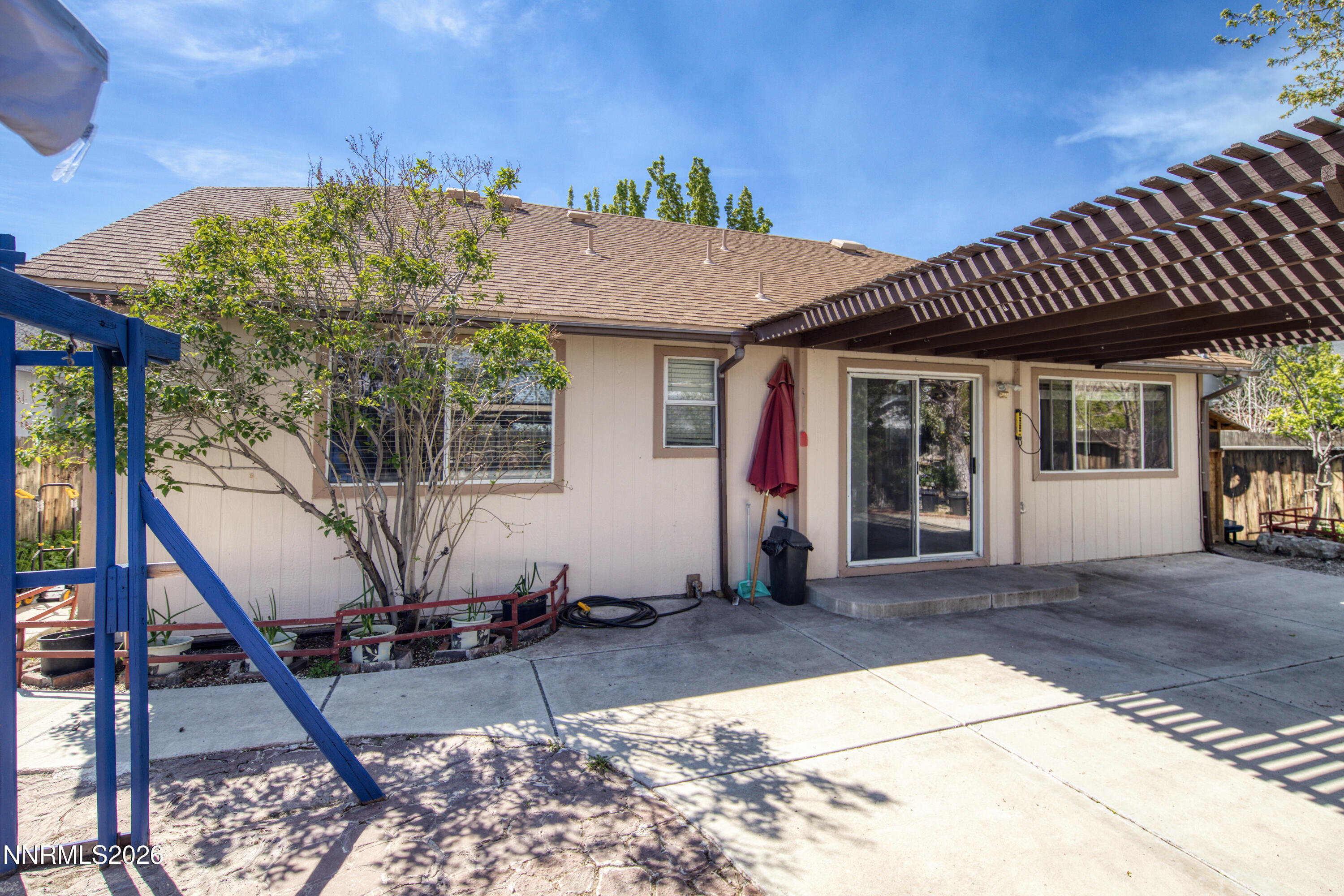 7951 Big River Drive Reno, NV 89506 - Photo 27 of 30 a view of a house with wooden fence