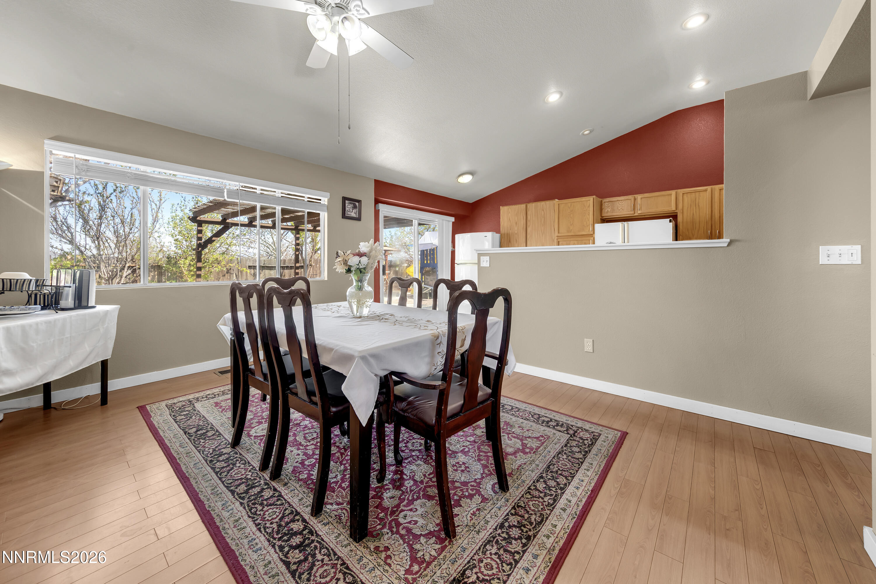 7951 Big River Drive Reno, NV 89506 - Photo 6 of 30 a view of a a dining room with furniture window and wooden floor
