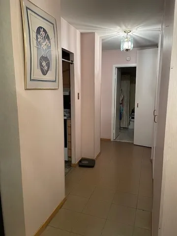 a view of an entryway with a workspace