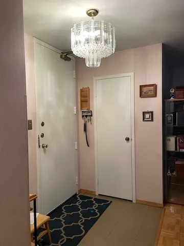 a view of a chandelier in a room