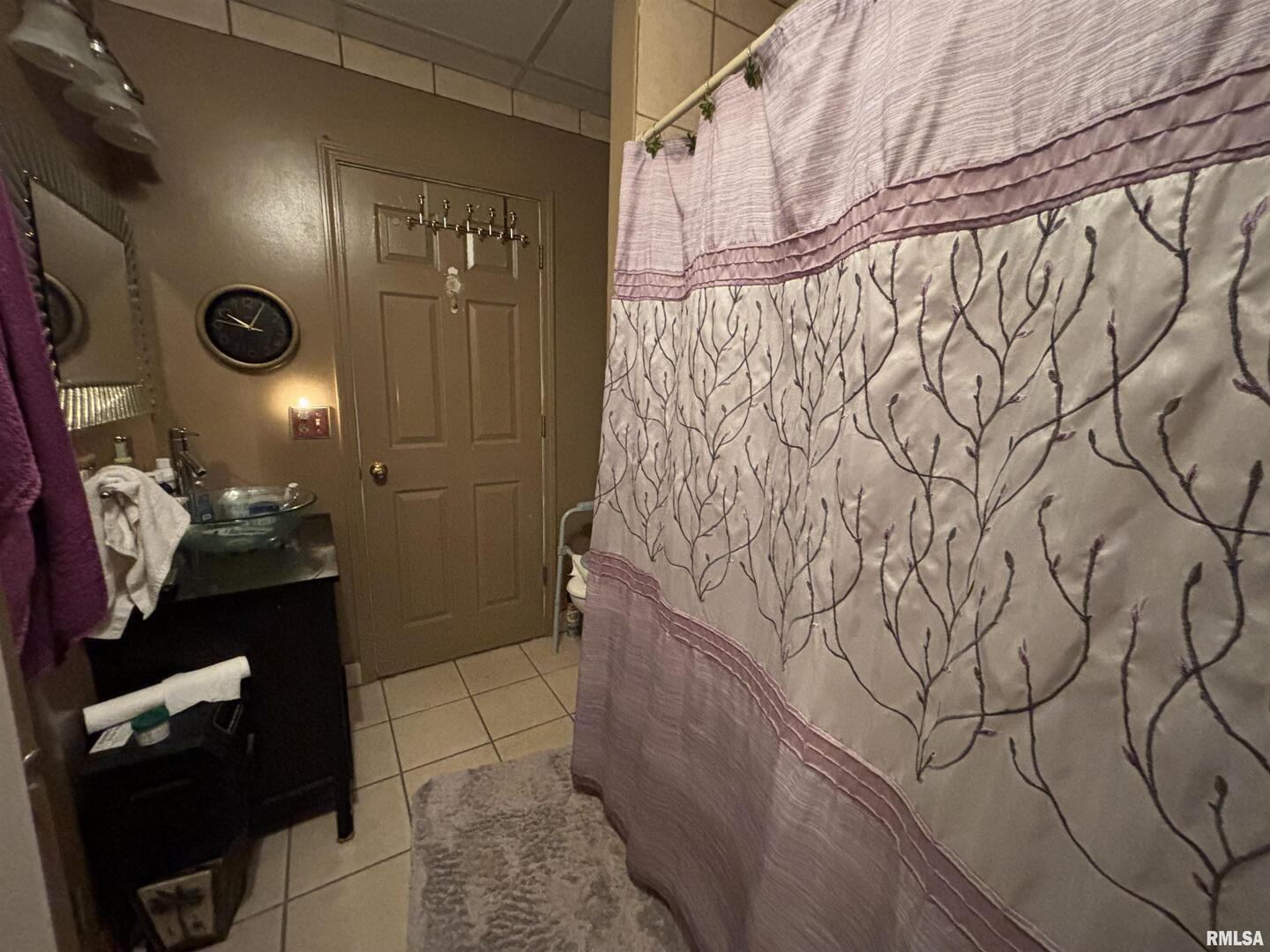 203 East 4th Street Brookport, IL 62910 - Photo 10 of 15 a bathroom with a sink and mirror