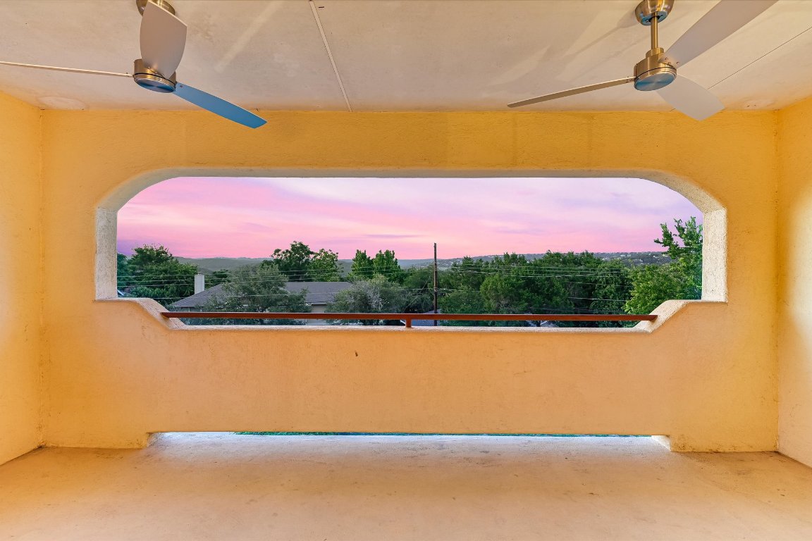 2405 Bahama Road Austin, TX 78733 - Photo 15 of 38 Patio terrace at dusk with new ceiling fans.