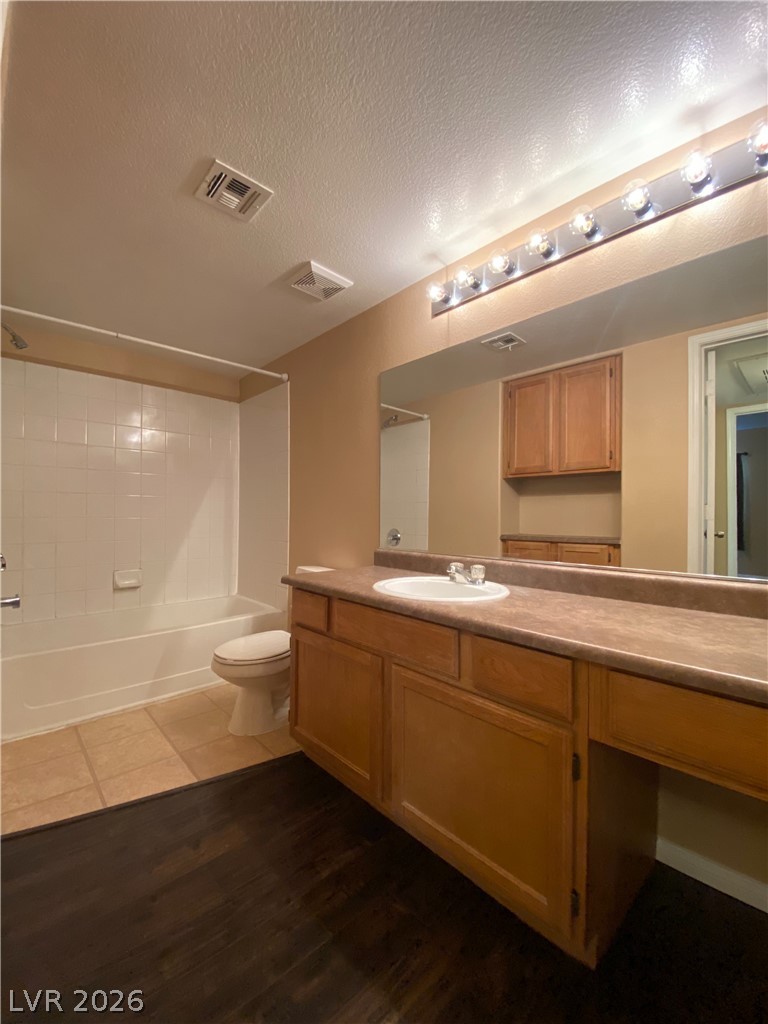 7255 West Sunset Road, Unit 2023 Las Vegas, NV 89113 - Photo 7 of 7 A classic vanity with generous counter space awaits in this well-appointed bath.