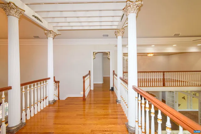 a view of a house with swimming pool and a yard