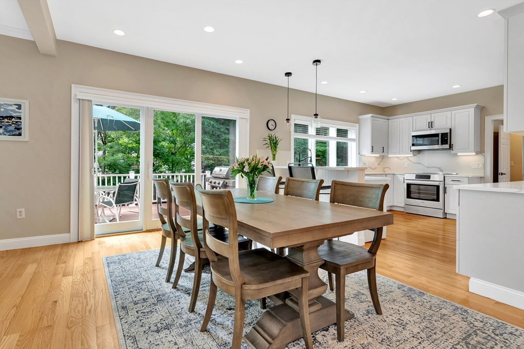 93 Pine Ridge Road Reading, MA 01867 - Photo 23 of 42 a view of a dining room with furniture window and wooden floor
