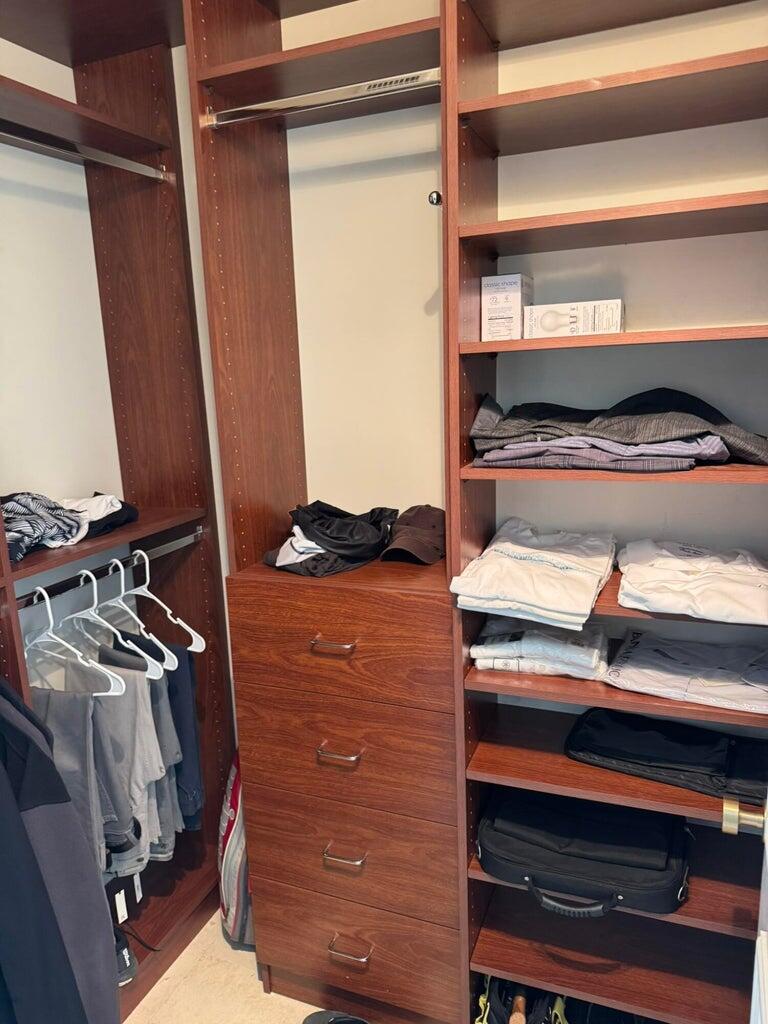 3400 Southwest 27th Avenue, Unit 303 Miami, FL 33133 - Photo 9 of 12 a view of walk in closet