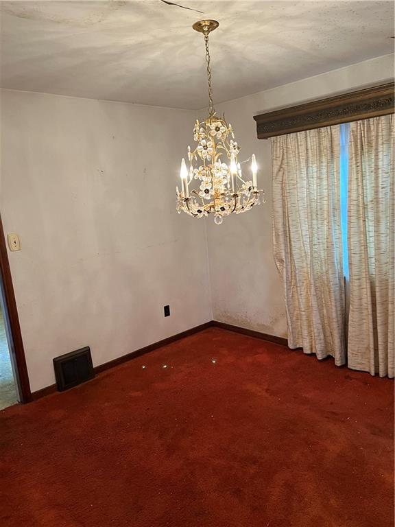 1023 Wetzel Road Pittsburgh, PA 15209 - Photo 3 of 11 a view of a chandelier in big room and chandelier fan