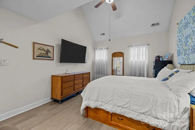 a bathroom with a sink double vanity and a mirror