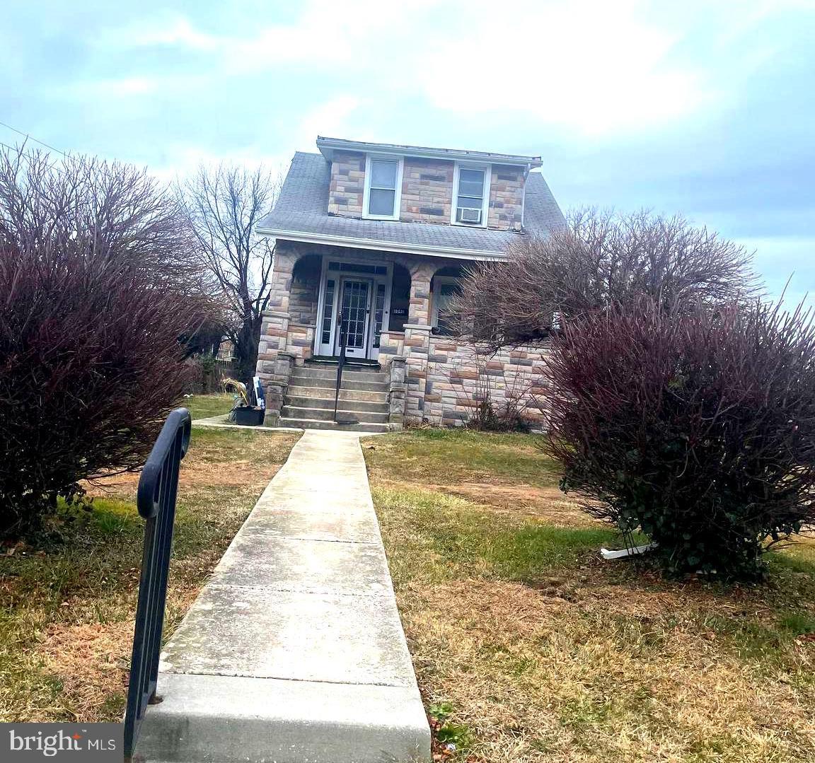 6040 Old Frederick Road Catonsville, MD 21228 - Photo 2 of 4 a view of a house with swimming pool