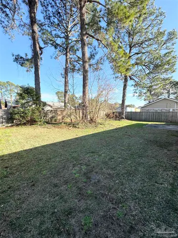 a view of yard with tree