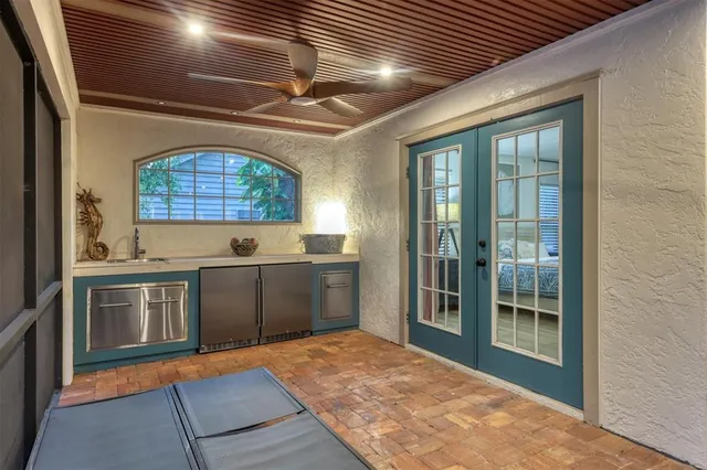 a view of a backyard with a swimming pool