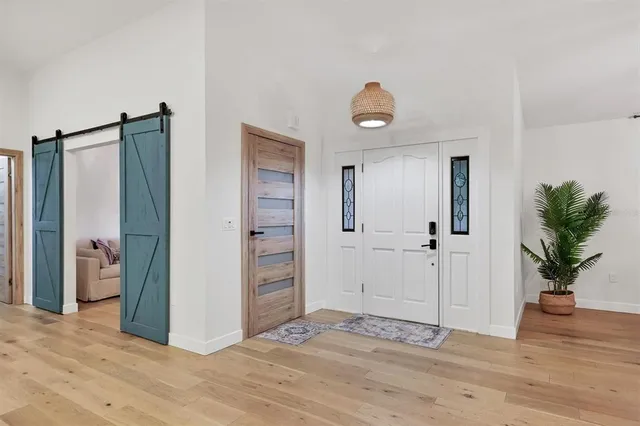 a open kitchen with stainless steel appliances granite countertop a sink and a stove