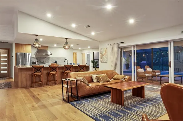 a living room with lots of furniture and a couch