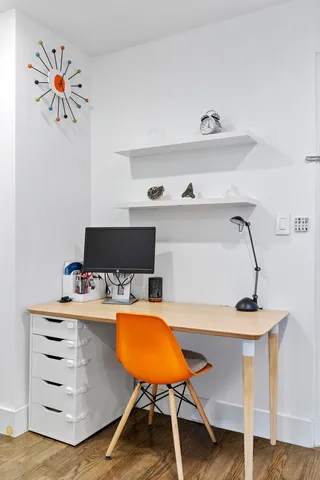 a kitchen with stainless steel appliances a refrigerator sink and microwave