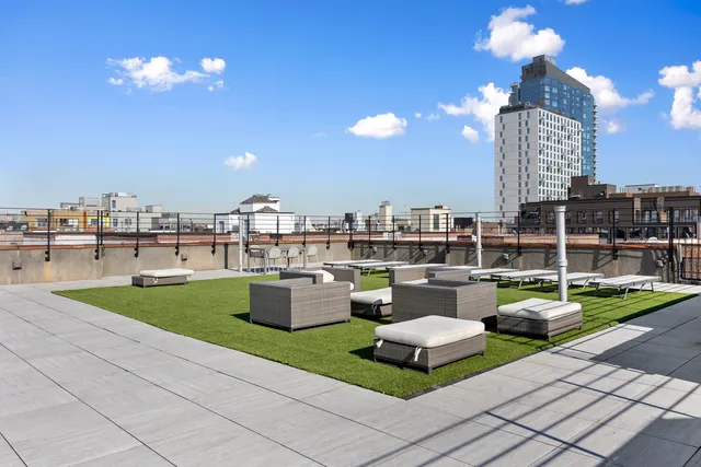 a workspace with furniture and window