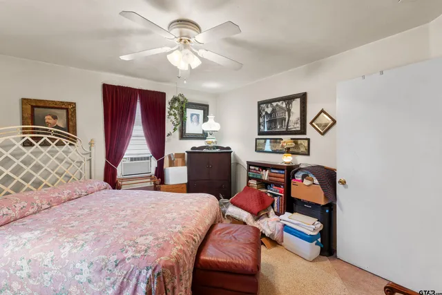 a bed room with a bed and a couch