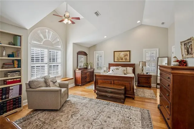 a bedroom with a bed and furniture