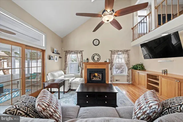 a kitchen with stainless steel appliances granite countertop wooden cabinets a stove top oven a sink and dishwasher