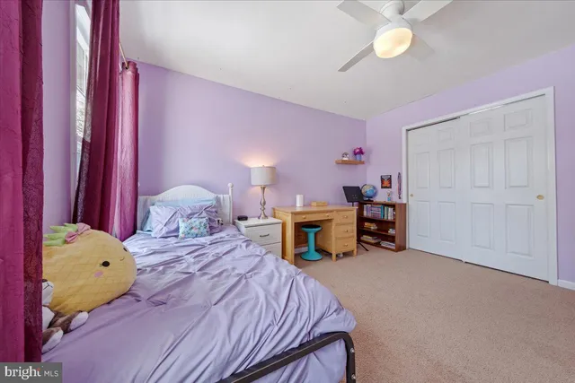 a bathroom with a granite countertop toilet sink and shower