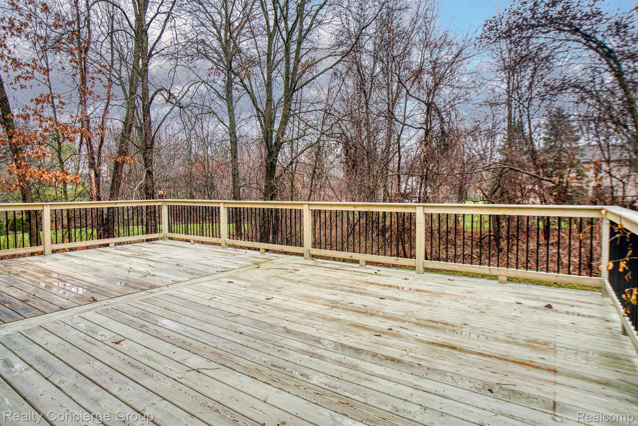 9514 Quail Ridge Run Brighton, MI 48114 - Photo 36 of 37 Enjoy nature views right from your back deck