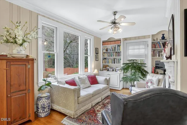 a dining room with furniture and wooden floor