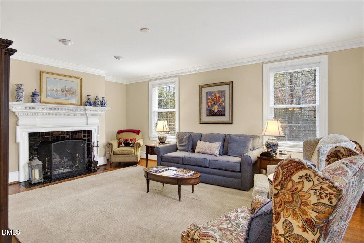 2064 Oxford Road Henderson, NC 27536 - Photo 3 of 68 a living room with furniture and a fireplace