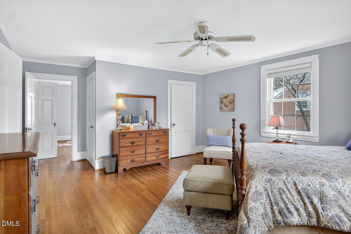 2064 Oxford Road Henderson, NC 27536 - Photo 43 of 68 a living room with furniture and a wooden floor